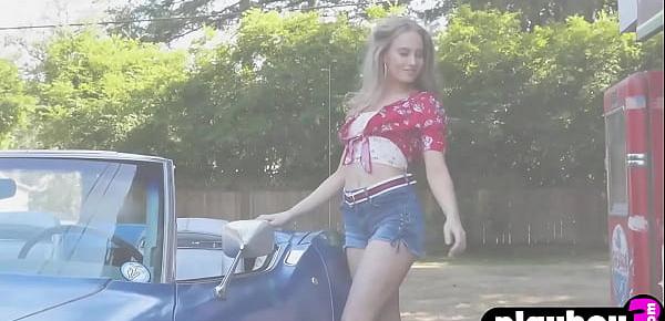  Pretty blonde model posed in the car totally naked